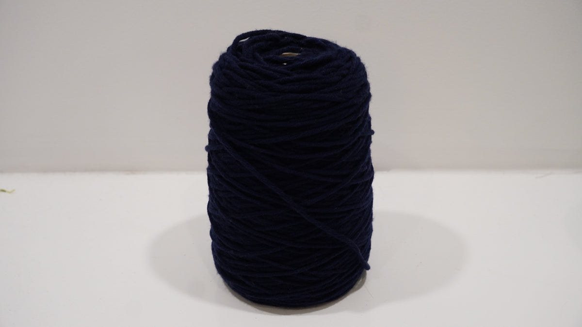 Deep navy tufting yarn single skein front view