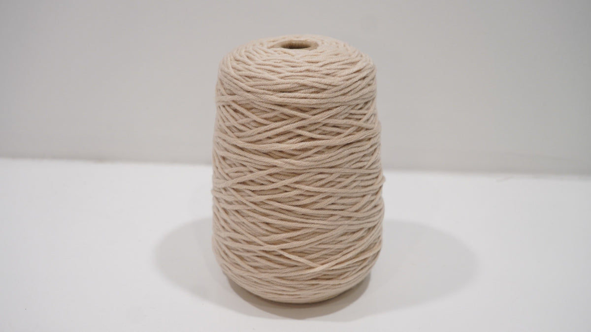 Warm beige tufting yarn single skein detail view